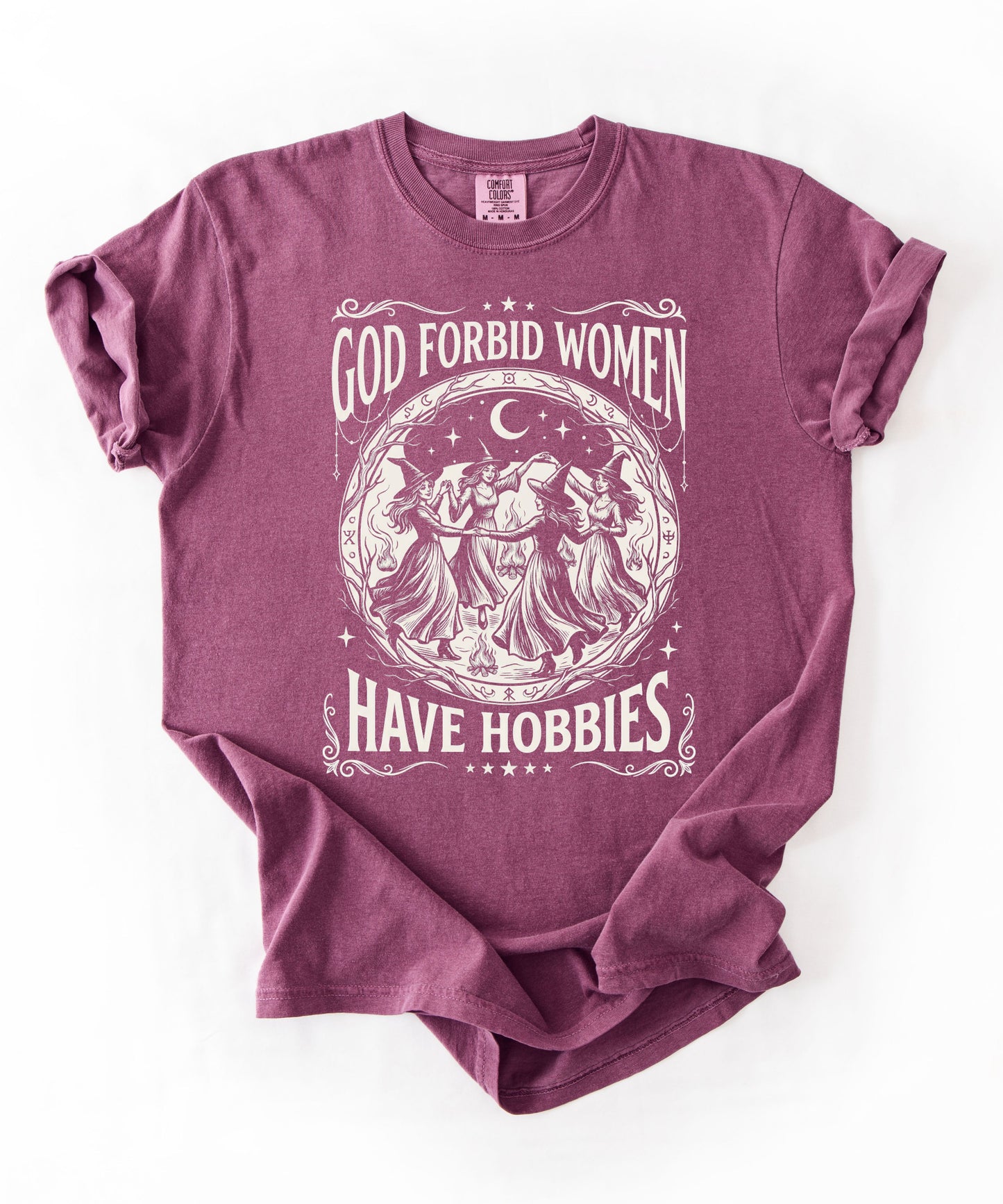 God Forbid Women Have Hobbies graphic t-shirt in Berry — vintage witch circular print on garment-dyed heavyweight cotton tee.