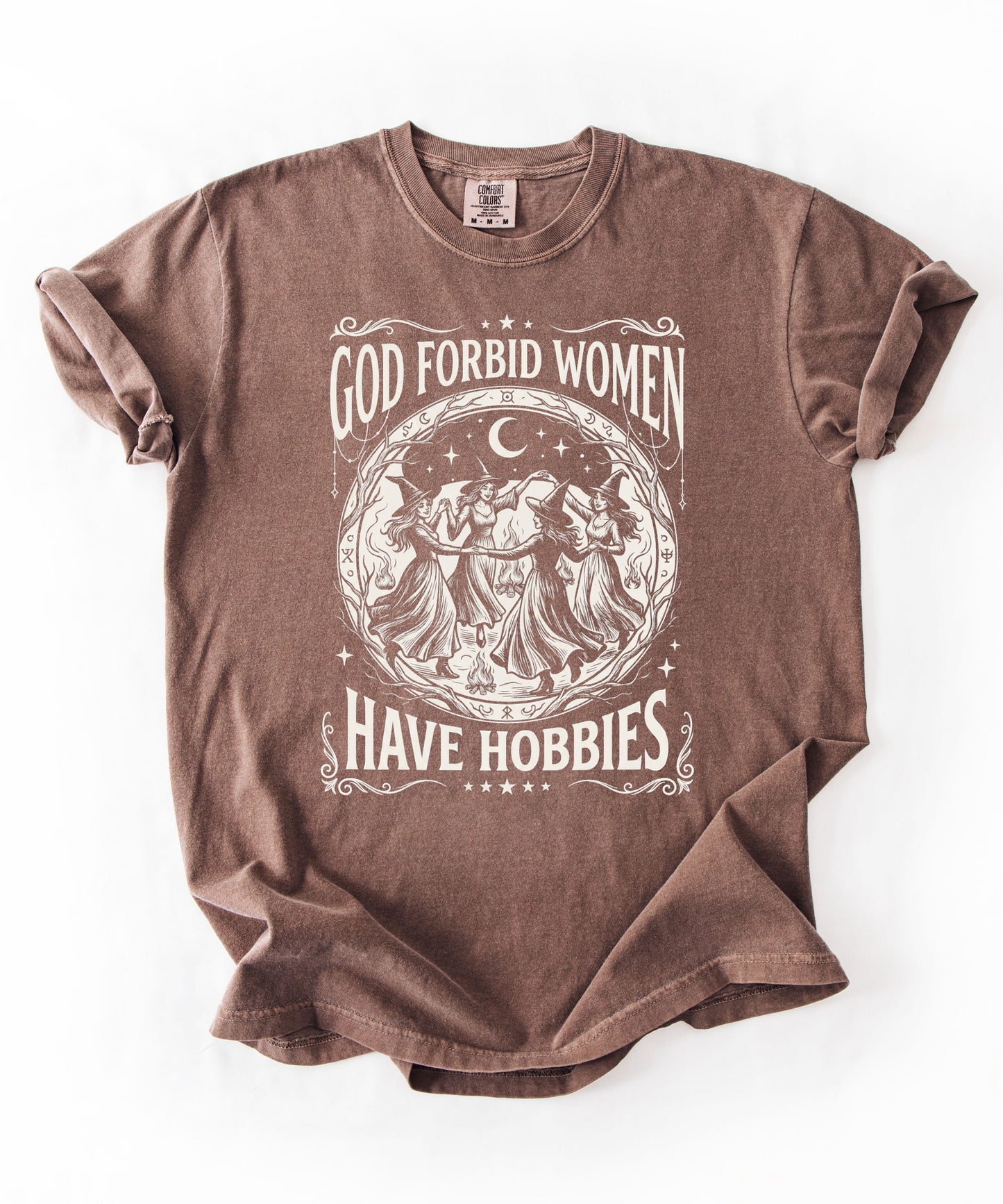 God Forbid Women Have Hobbies graphic t-shirt in Espresso— vintage witch circular print on garment-dyed heavyweight cotton tee.
