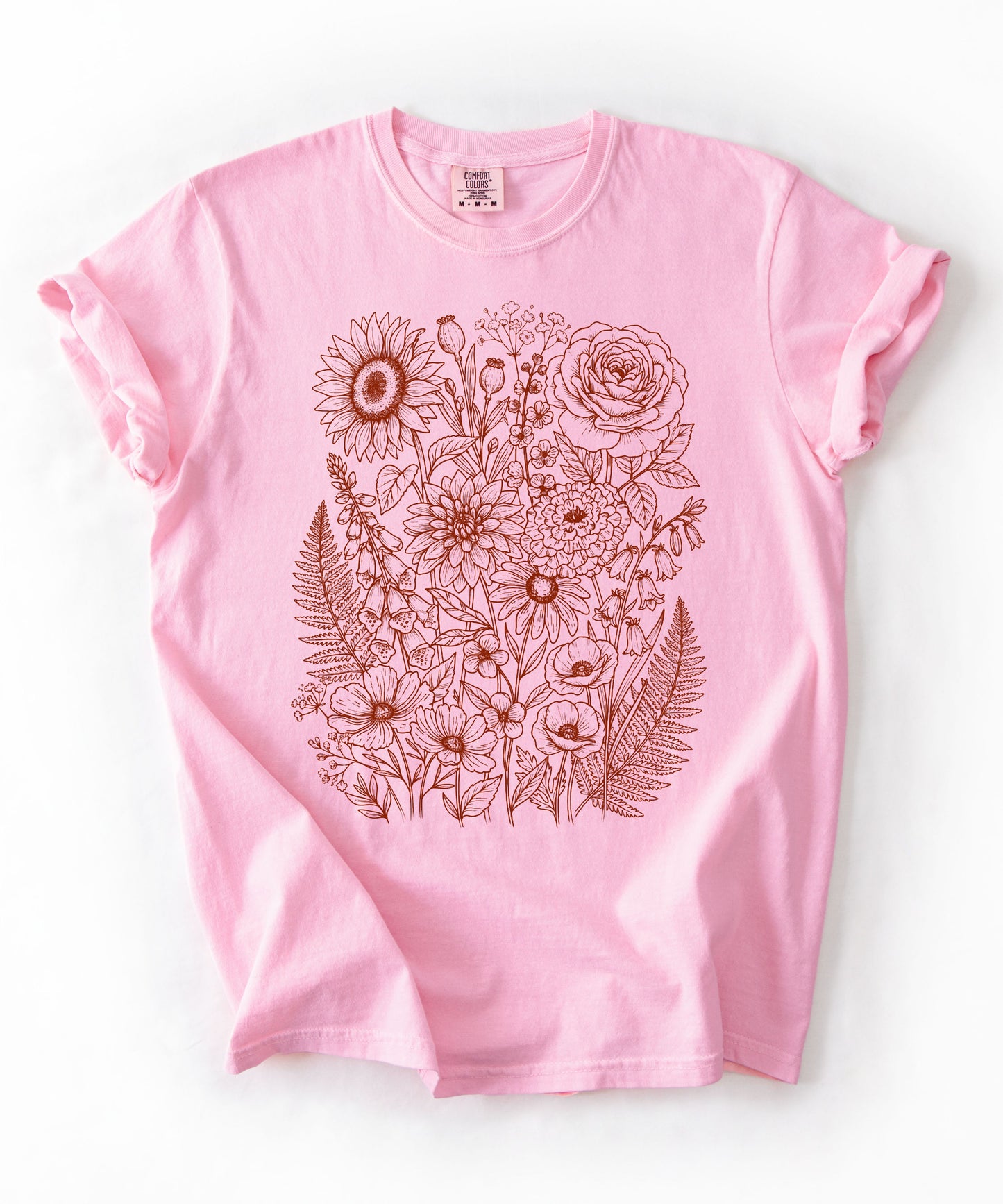 Comfort Colors® Blossom shirt with hand-drawn botanical line art print featuring sunflower, rose, dahlia, and wildflowers