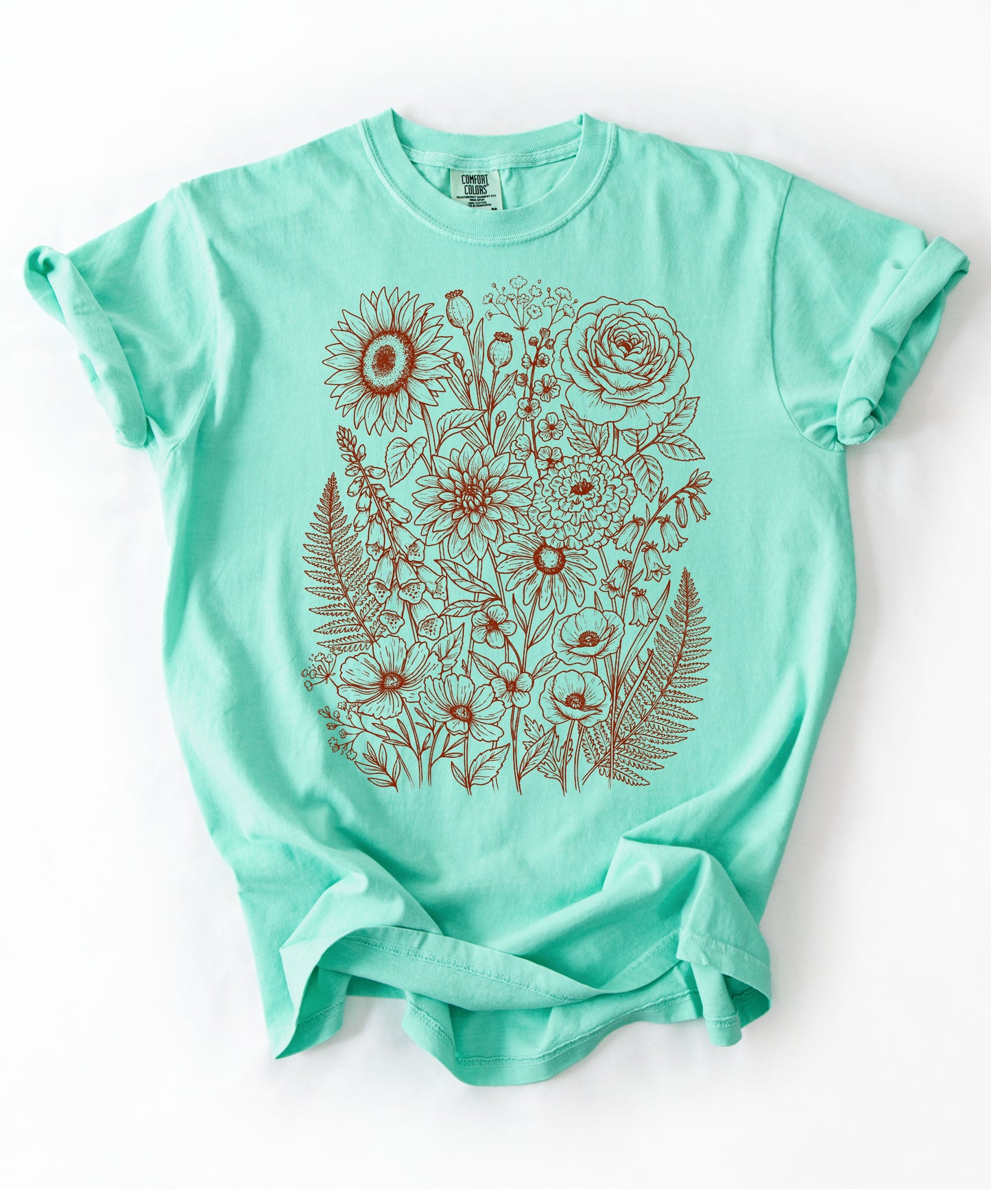 Comfort Colors® Island Reef shirt with hand-drawn botanical line art print featuring sunflower, rose, dahlia, and wildflowers