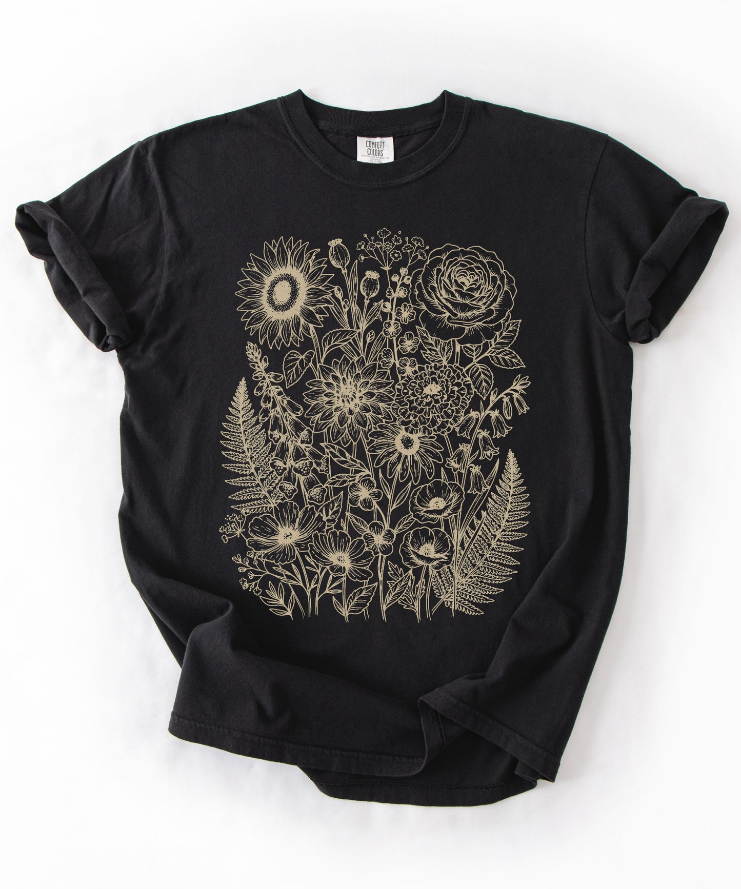 Comfort Colors® Black shirt with hand-drawn botanical line art print featuring sunflower, rose, dahlia, and wildflowers