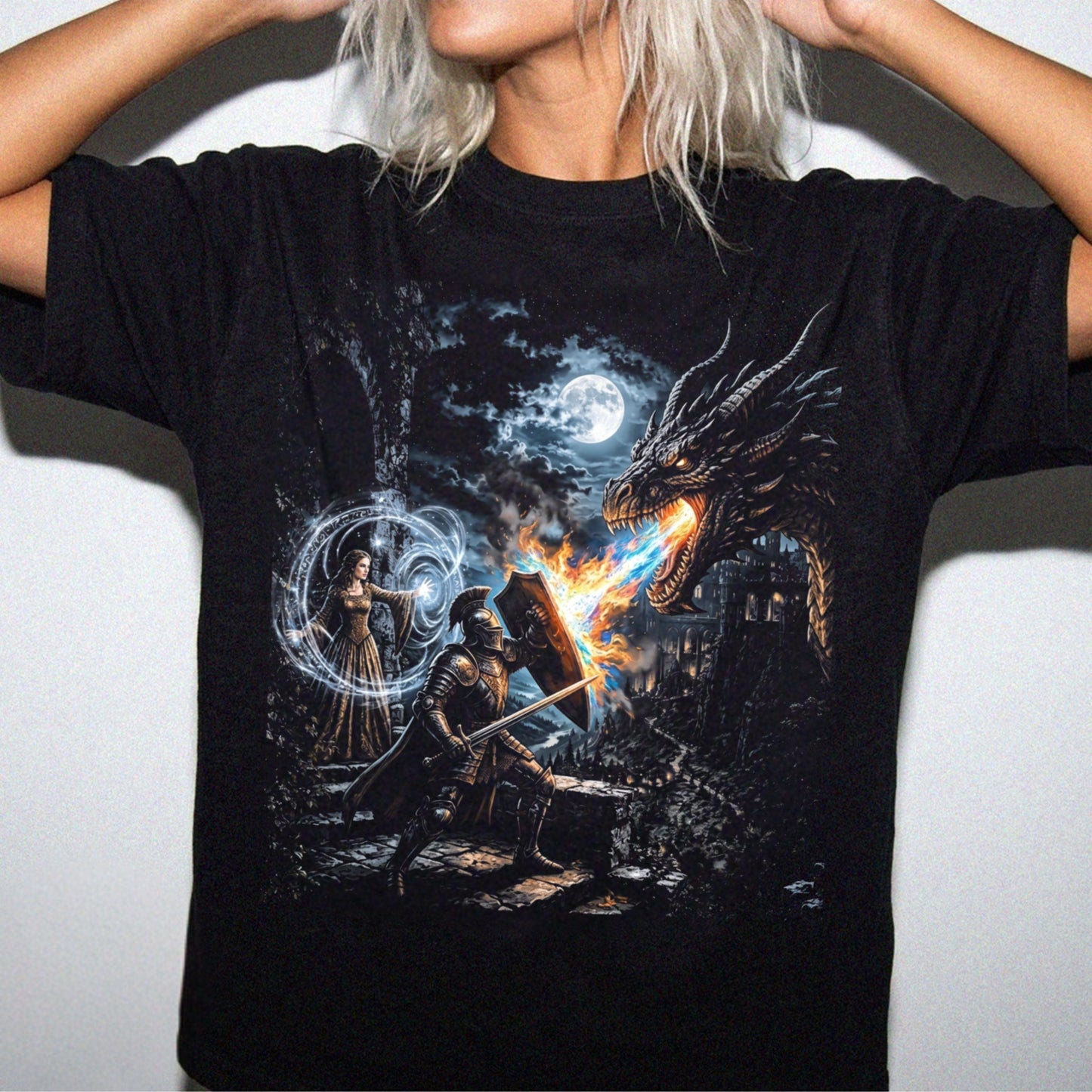 Woman wearing black dragon knight dark romance graphic tee with moonlit castle battle scene – fantasy book lover shirt
