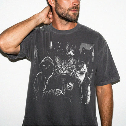 Man wearing garment-dyed pepper Cat Gang graphic tee with moody cat mob streetwear print — oversized relaxed fit