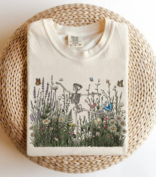 Dancing skeleton wildflower botanical graphic on ivory Comfort Colors garment-dyed t-shirt