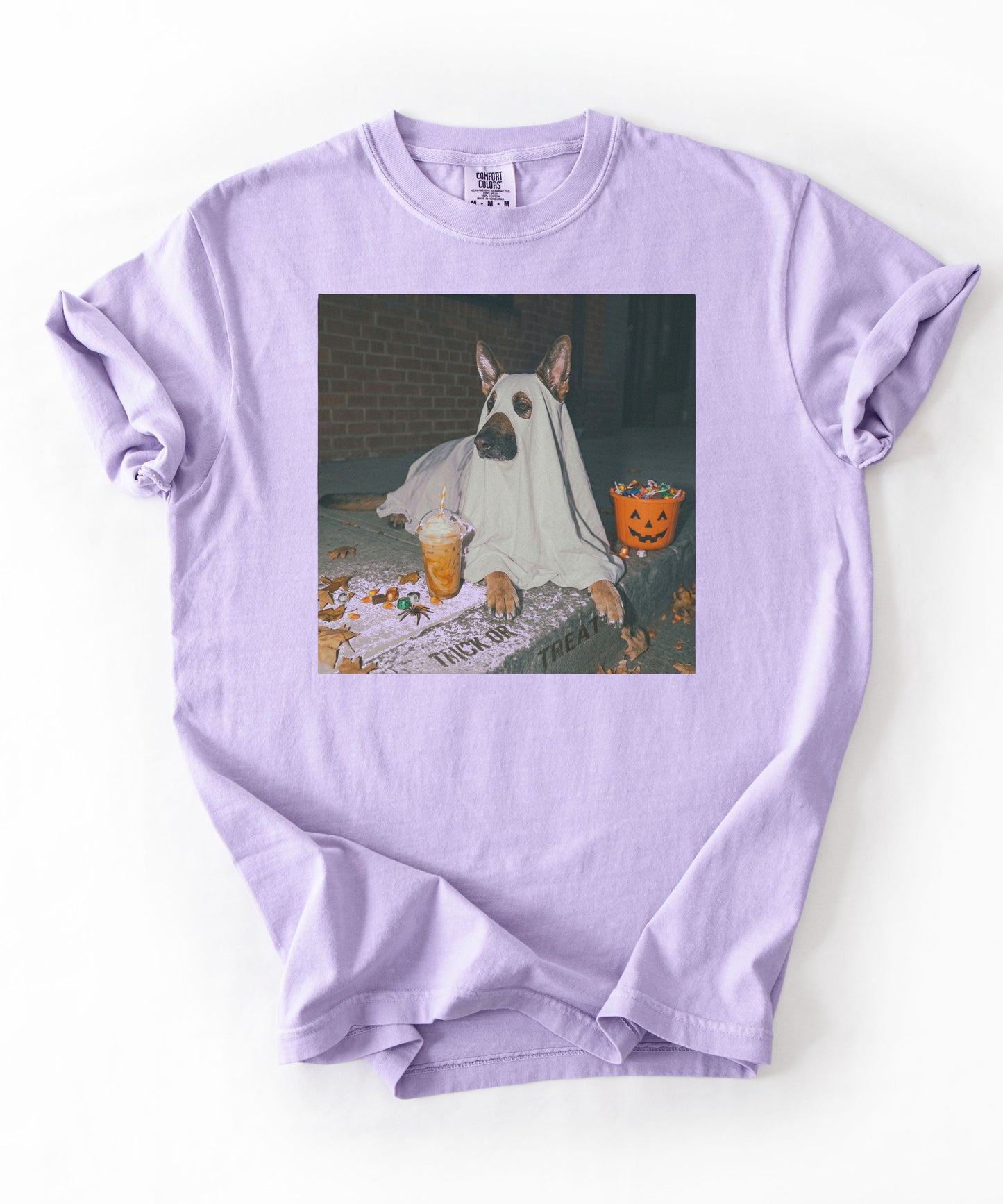 Orchid garment-dyed t-shirt with German Shepherd in ghost costume jack-o'-lantern treat bucket — Halloween ghost dog tee by GodaStudio
