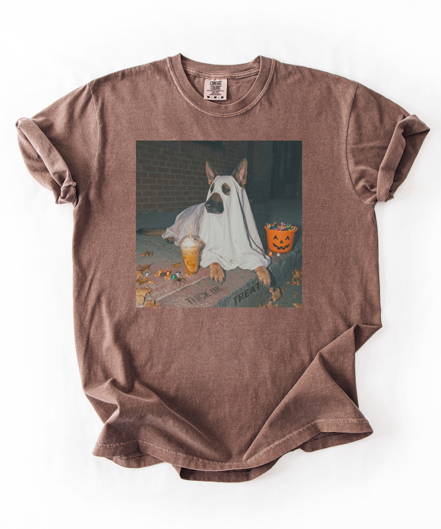 Espresso garment-dyed t-shirt with German Shepherd in ghost costume jack-o'-lantern treat bucket — Halloween ghost dog tee by GodaStudio