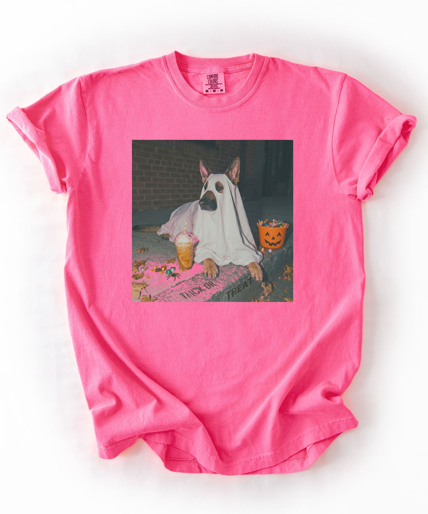 Neon Pink garment-dyed t-shirt with German Shepherd in ghost costume jack-o'-lantern treat bucket — Halloween ghost dog tee by GodaStudio
