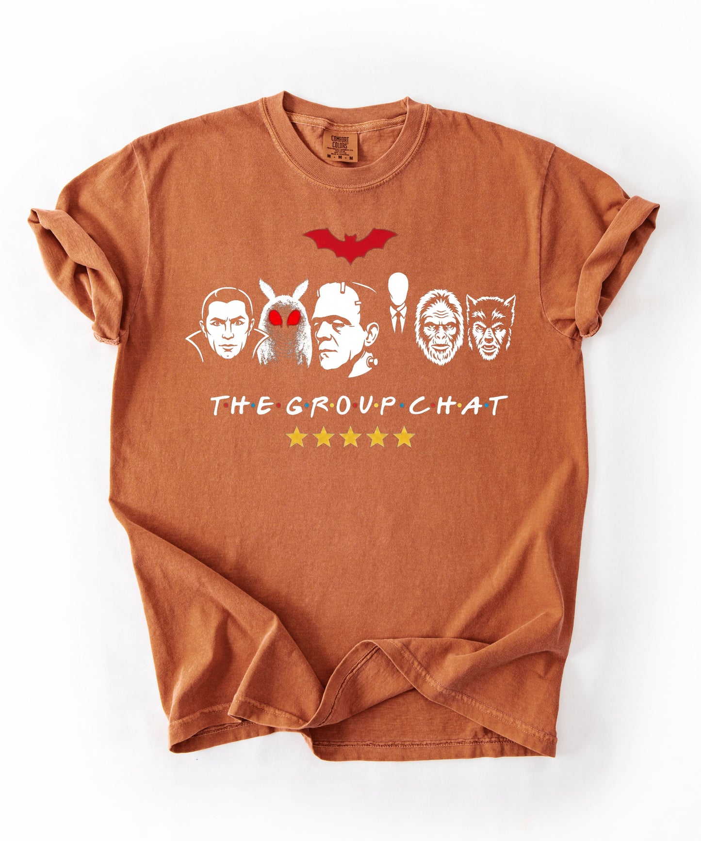 Yam garment-dyed unisex t-shirt featuring The Group Chat horror monster squad graphic — Dracula, Mothman with red eyes, Frankenstein, Slender Man, Bigfoot, and Werewolf faces with red bat above and five gold stars below