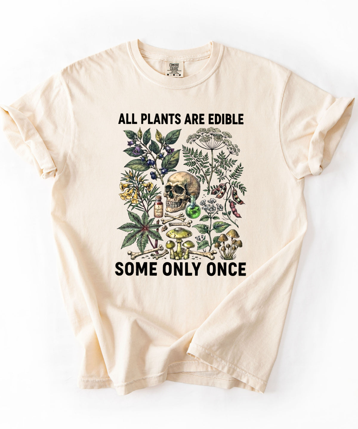 Botanical skull graphic tee in Ivory — "All Plants Are Edible, Some Only Once" garment-dyed t-shirt
