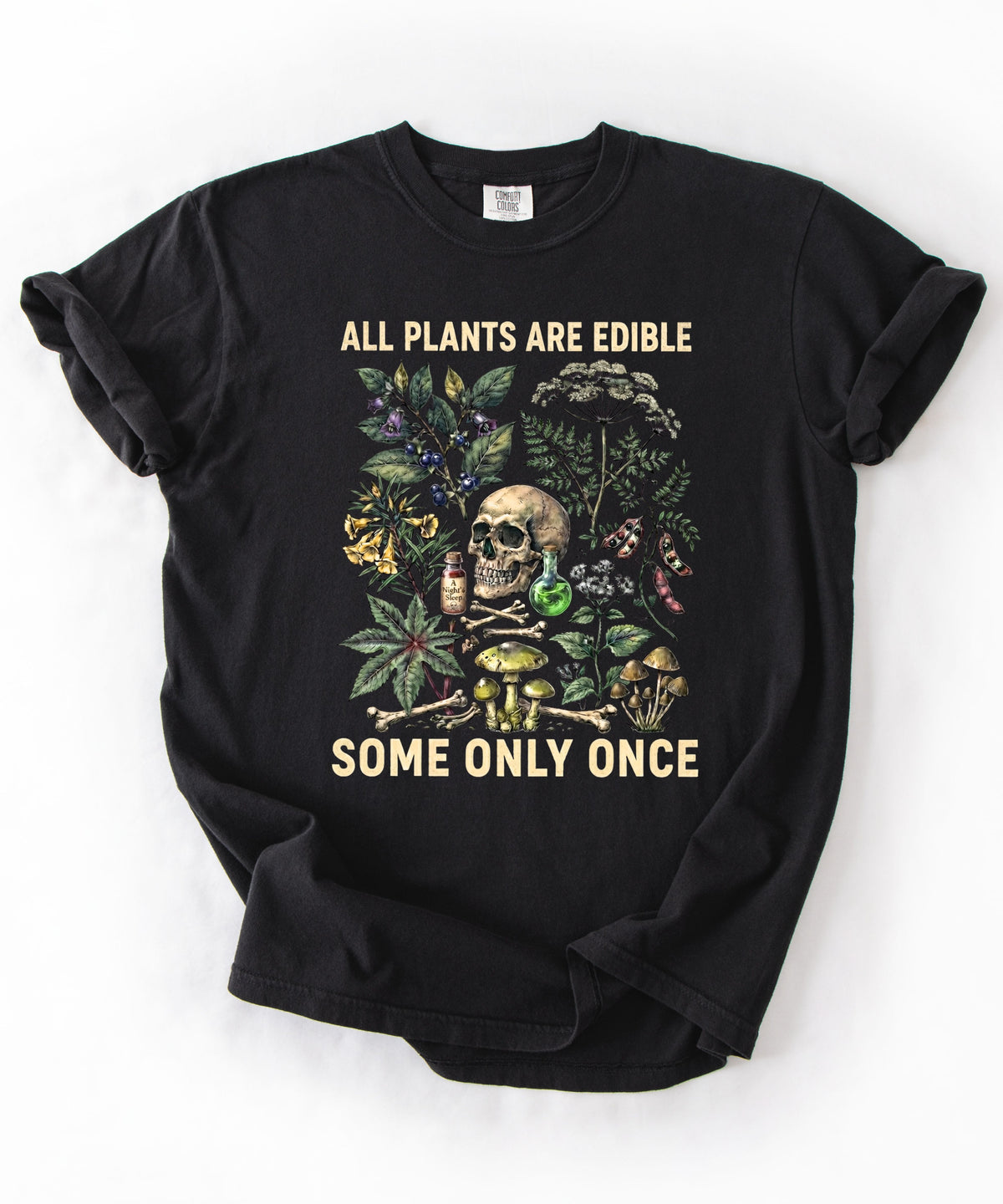 Botanical skull graphic tee in Black — "All Plants Are Edible, Some Only Once" garment-dyed t-shirt