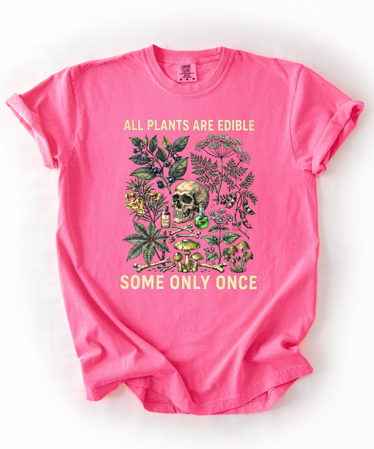 Botanical skull graphic tee in Neon Pink — "All Plants Are Edible, Some Only Once" garment-dyed t-shirt