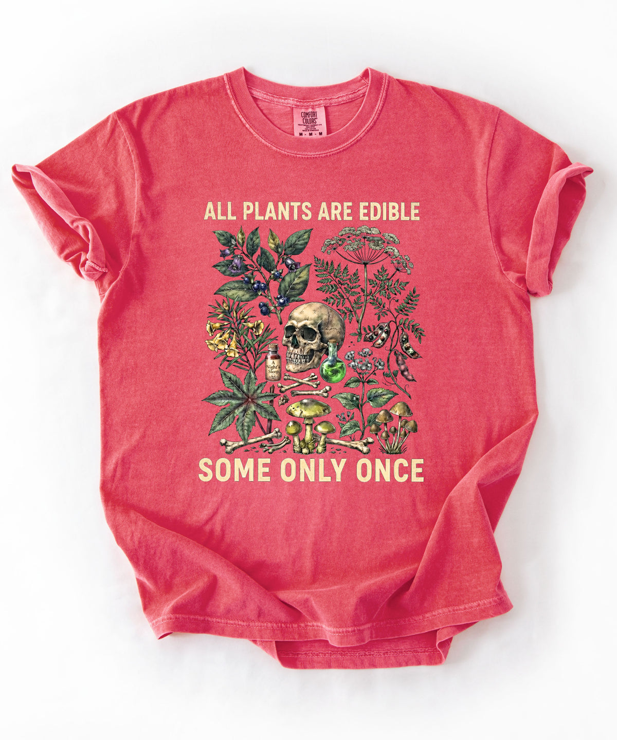 Botanical skull graphic tee in Crunchberry — "All Plants Are Edible, Some Only Once" garment-dyed t-shirt