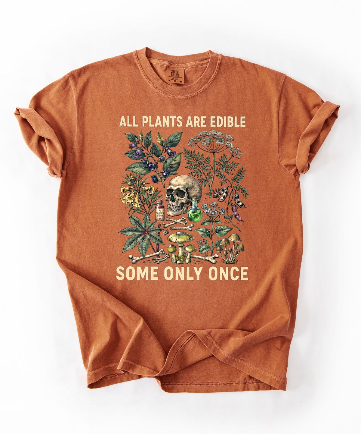 Botanical skull graphic tee in Yam — "All Plants Are Edible, Some Only Once" garment-dyed t-shirt