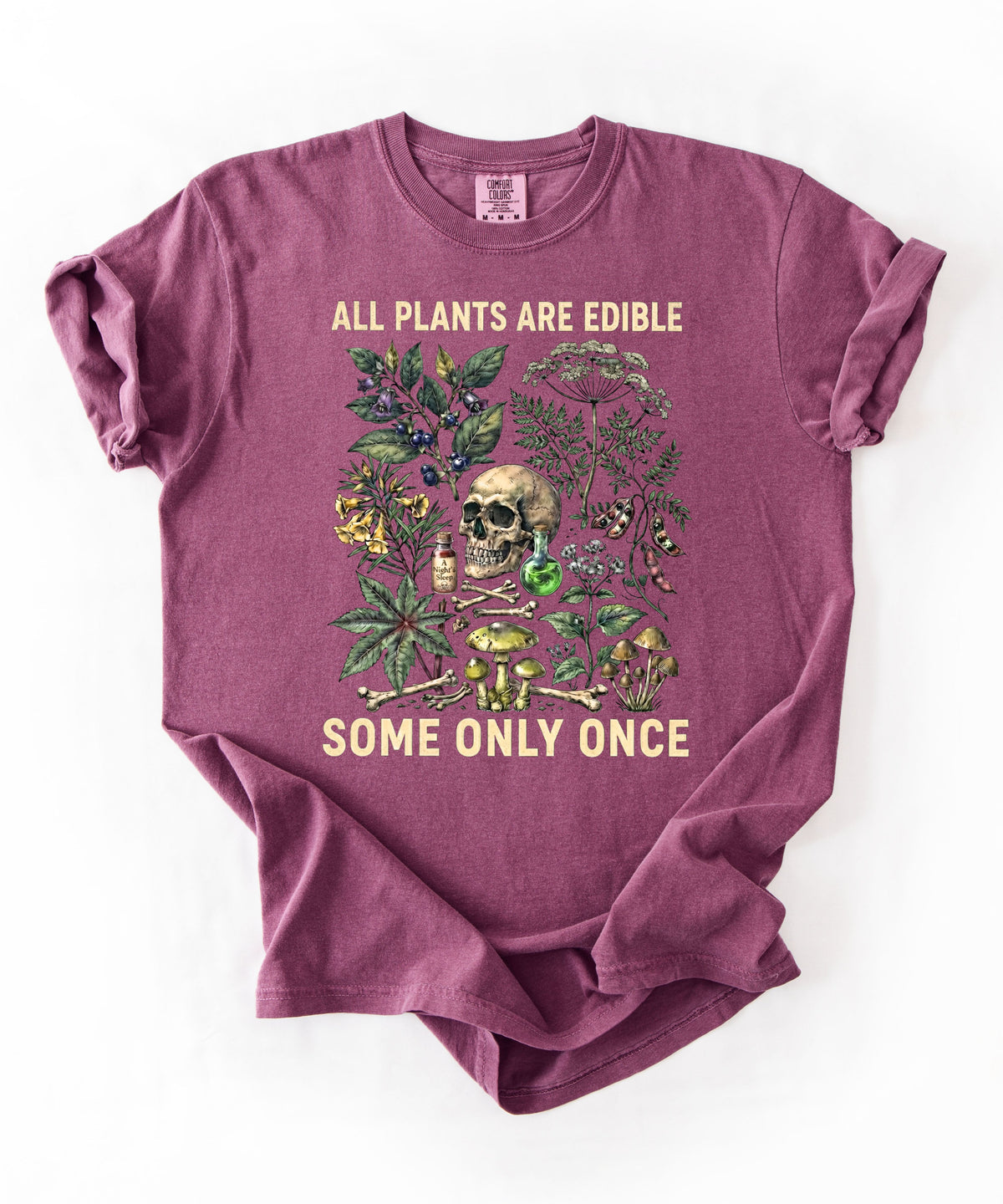 Botanical skull graphic tee in Berry— "All Plants Are Edible, Some Only Once" garment-dyed t-shirt