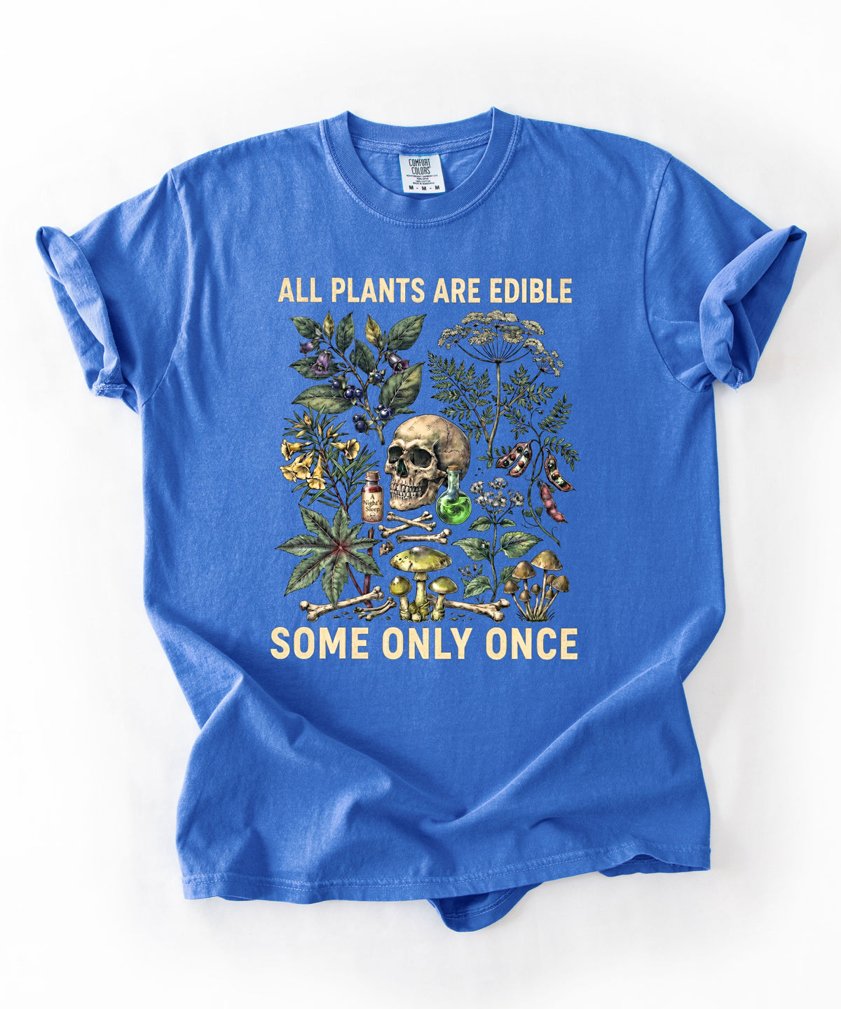 Botanical skull graphic tee in Flo Blue — "All Plants Are Edible, Some Only Once" garment-dyed t-shirt
