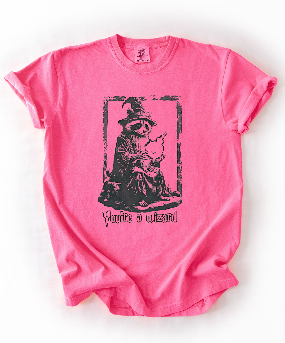 Funny wizard raccoon graphic tee in Neon Pink, vintage engraving style with "You're a Wizard Harry" text