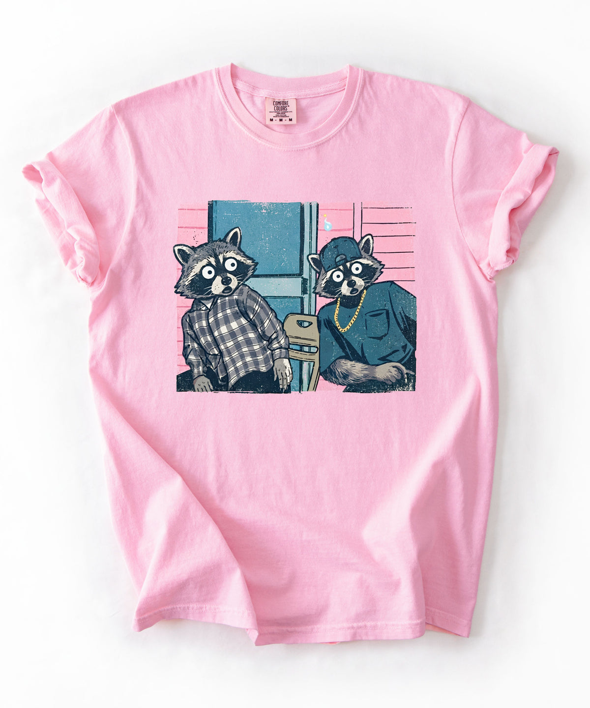 Two raccoon neighbors on a porch graphic tee in Blossom, vintage pastel illustration meme design