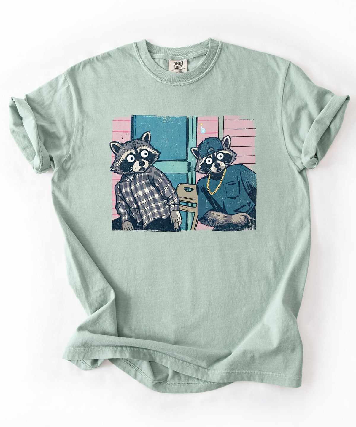 Two raccoon neighbors on a porch graphic tee in Bay, vintage pastel illustration meme design