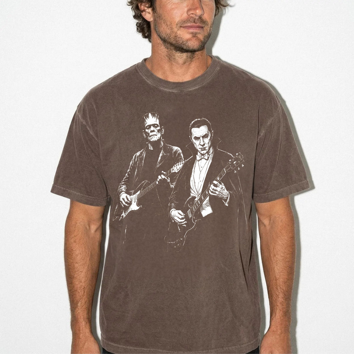 Espresso garment-dyed Frankenstein and Dracula guitar tee with retro Halloween rock band graphic 