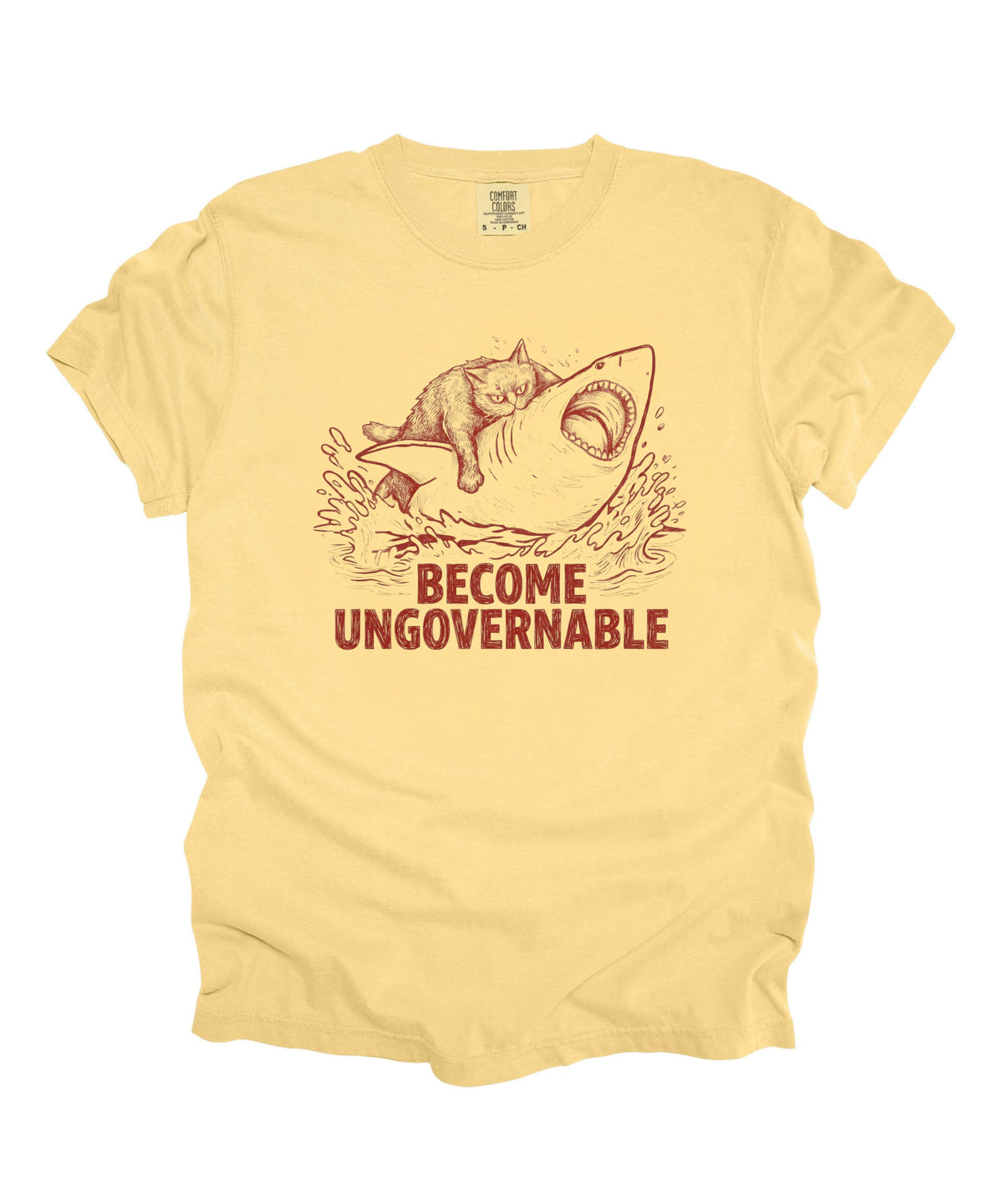 Butter t-shirt with a red graphic of a cat on a Shark and the text 'BECOME UNGOVERNABLE'. 