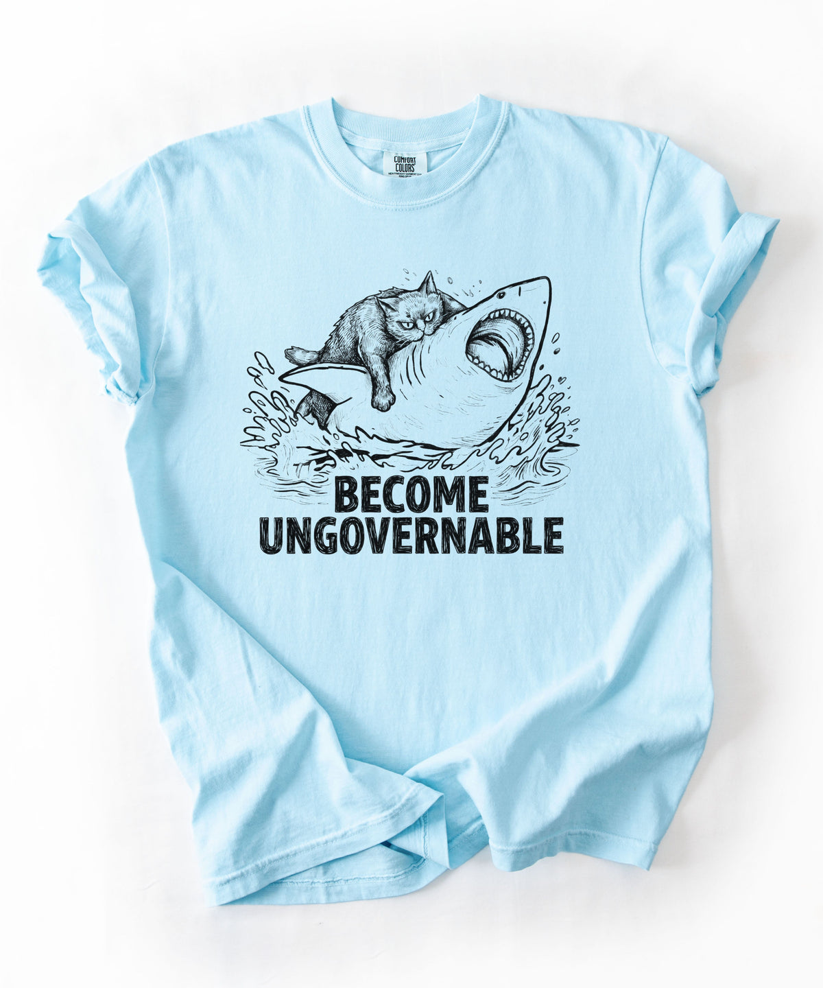 Chambray t-shirt with a graphic of a cat on a Shark and the text 'BECOME UNGOVERNABLE'. 