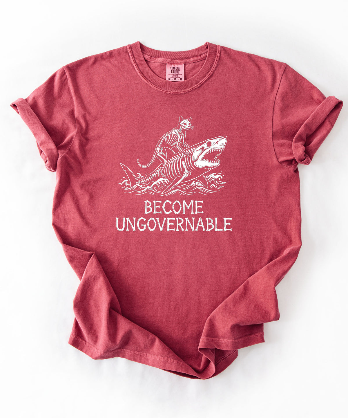 Become Ungovernable cat riding shark graphic t-shirt in Crimson garment-dyed cotton