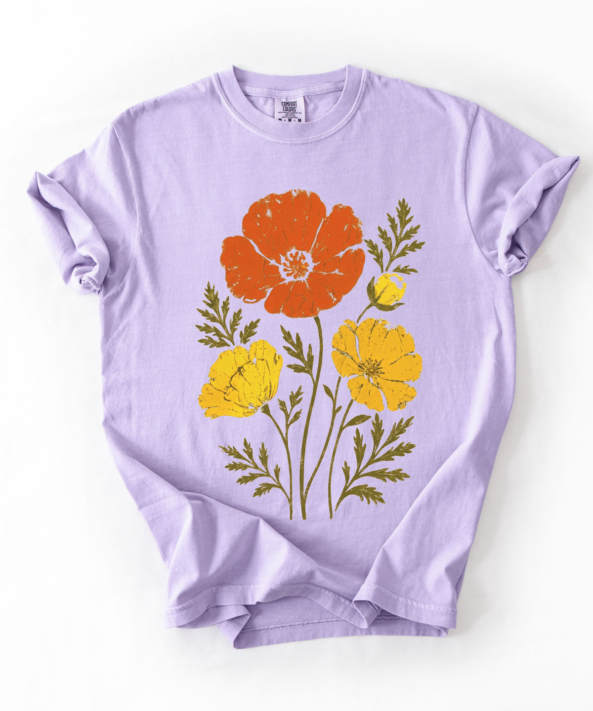 An Orchird short-sleeve crewneck t-shirt with a graphic print of three stylized poppy flowers in orange, yellow, and green, laid flat on a white background.