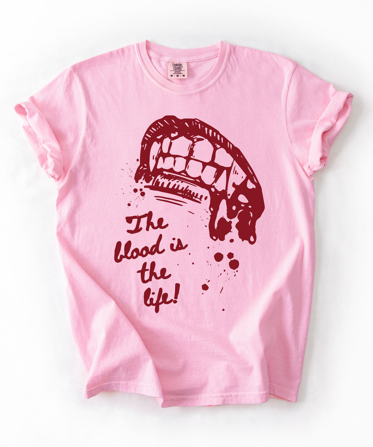 Vampire bite the blood is the life horror graphic t-shirt in Blossom — heavyweight garment dyed tee


