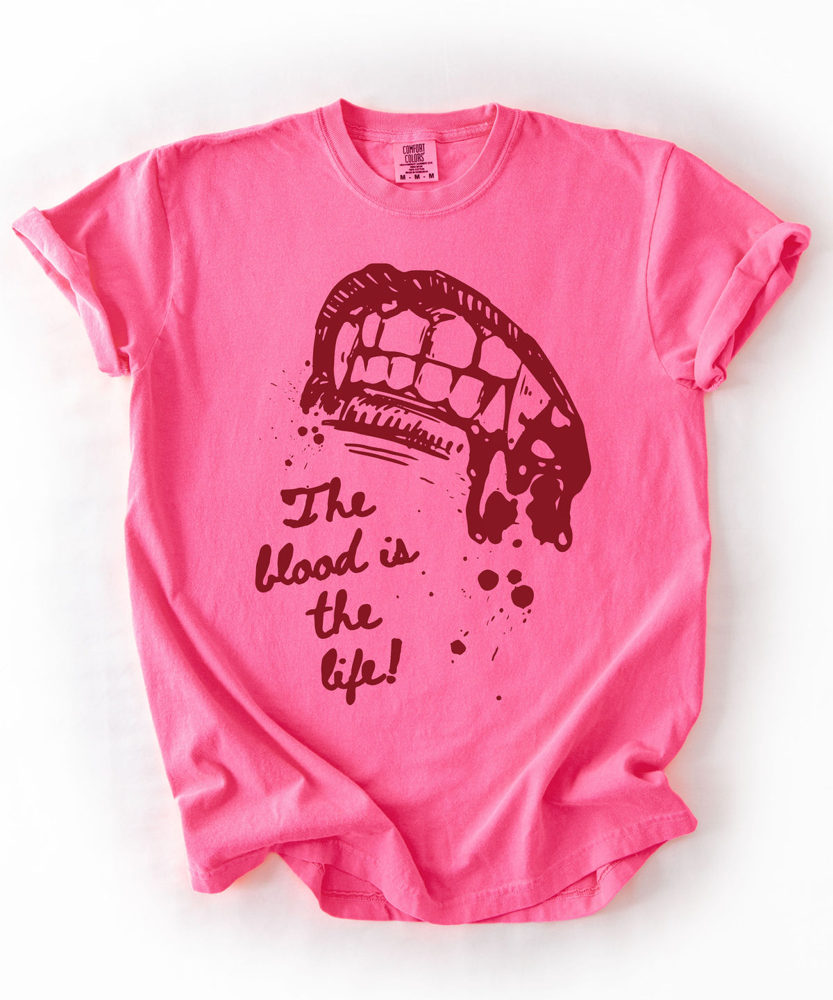 Vampire bite the blood is the life horror graphic t-shirt in Neon Pink — heavyweight garment dyed tee

