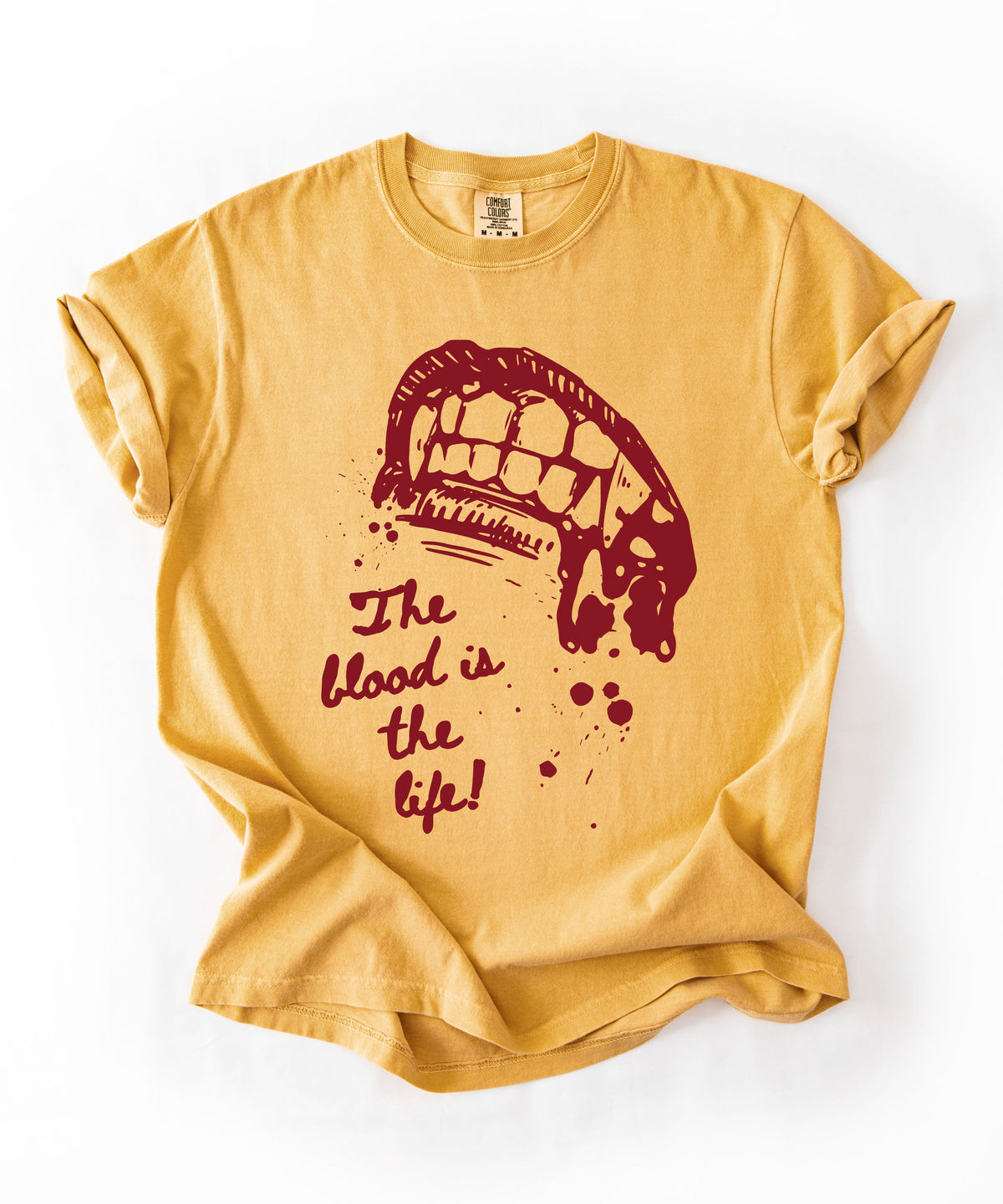 Vampire bite the blood is the life horror graphic t-shirt in Mustard — heavyweight garment dyed tee

