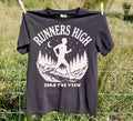 Black Runners High trail running T-shirt with a lone runner beneath a moonlit pine forest graphic