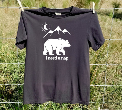 Black colored Bear and mountain graphic tee, flat lay