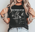 A woman wearing a black graphic t-shirt with a white print of a cat and physics equations, paired with light wash jeans, set against a plain light gray background.