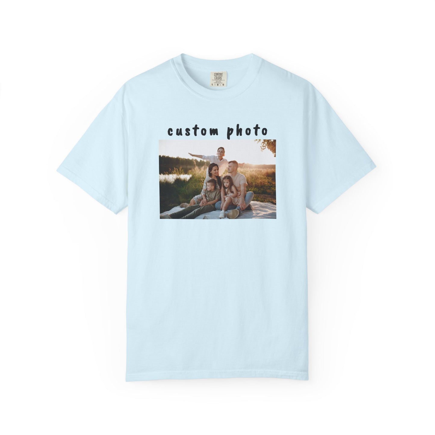 Chambray t-shirt with a printed photo of a family by a lake on a white background