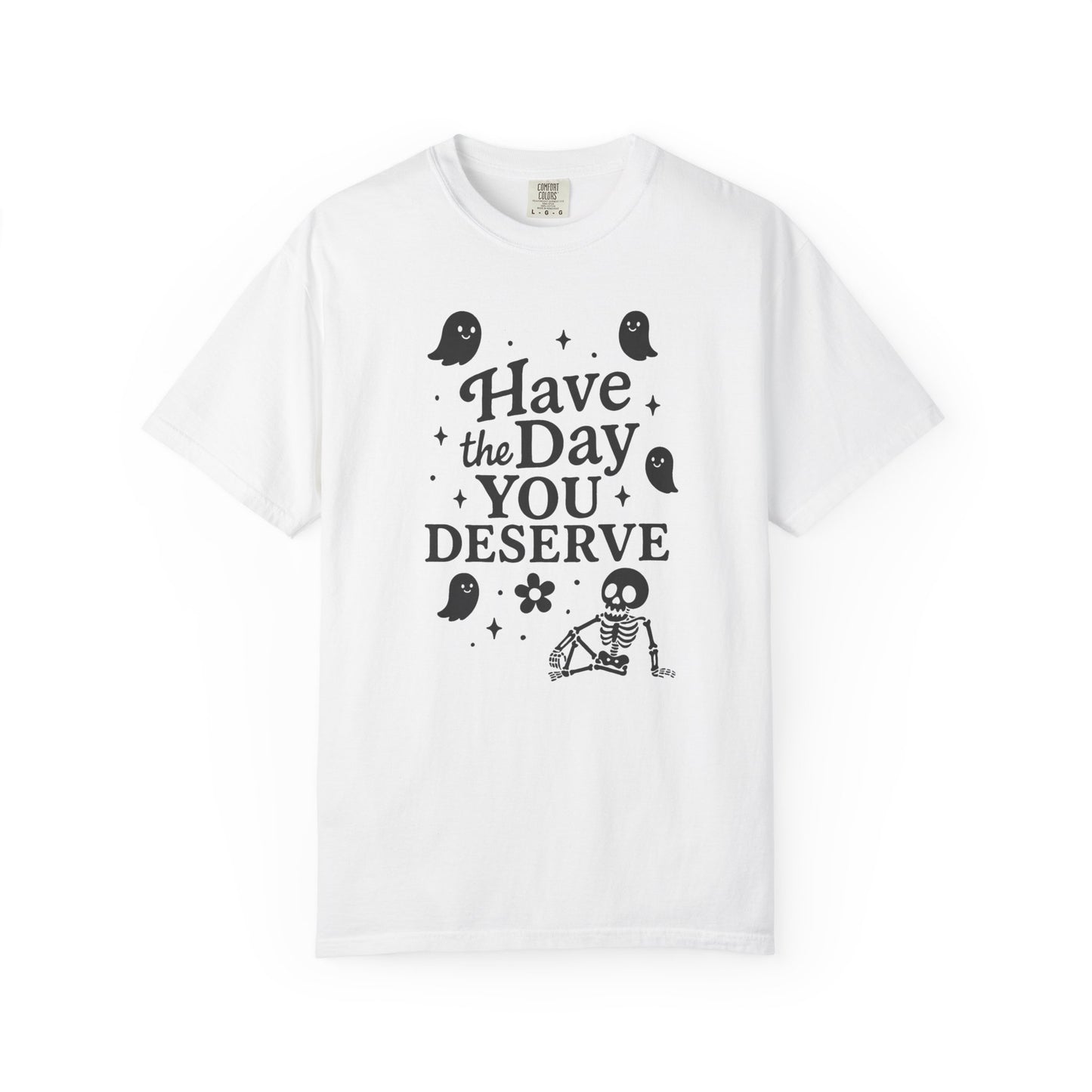 white t-shirt with Halloween-themed design and text that says "have the day you deserve" on a white background