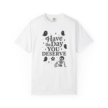 white t-shirt with Halloween-themed design and text that says "have the day you deserve" on a white background
