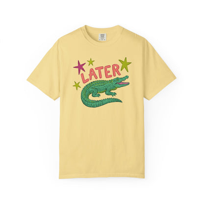 butter t-shirts with alligator graphics on front "later gator" and the text on back i"n a while crocodile"a plain background