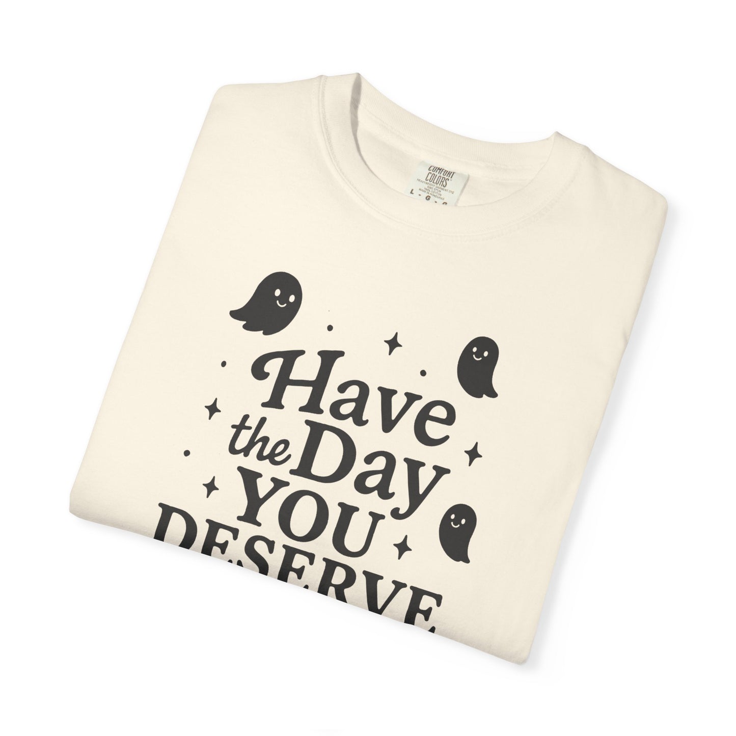 ivory  t-shirt with Halloween-themed design and text that says "have the day you deserve" on a white background