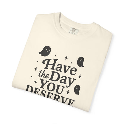 ivory  t-shirt with Halloween-themed design and text that says "have the day you deserve" on a white background