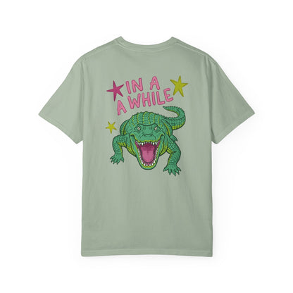 bay t-shirts with alligator graphics on front "later gator" and the text on back i"n a while crocodile"a plain background