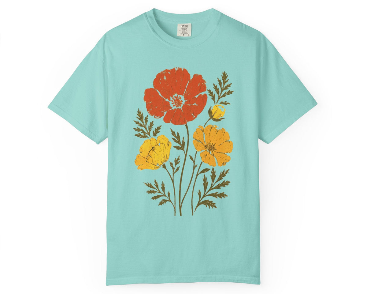 A Chalky Mint short-sleeve crewneck t-shirt featuring a retro-style graphic of red, yellow, and orange poppy flowers with green stems on the front, displayed against a solid white background.