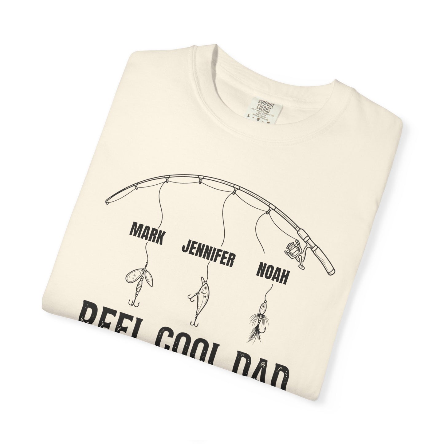 Folded ivory t-shirt with fishing graphic and text on a white background