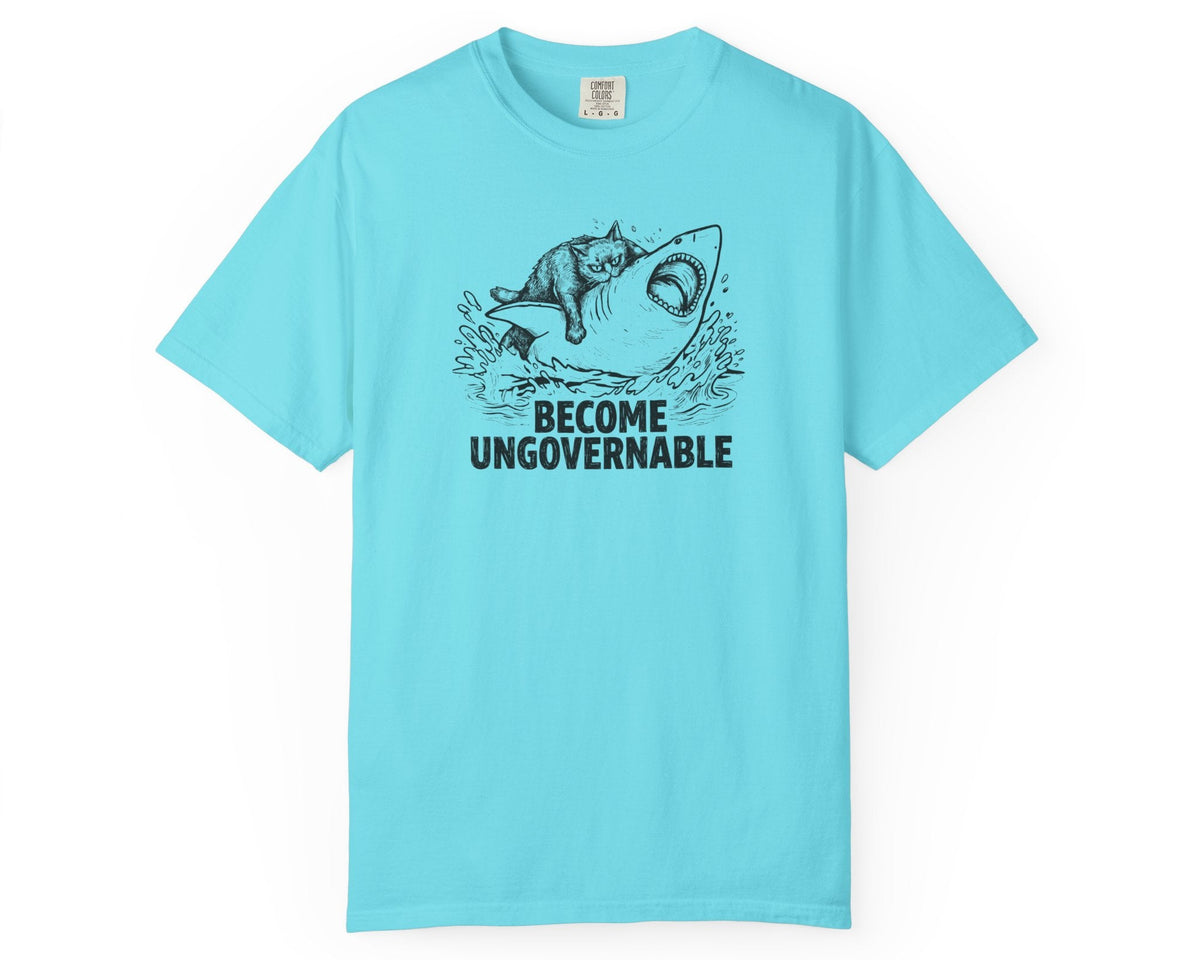 Lagoon Blue t-shirt with a graphic of a cat on a Shark and the text 'BECOME UNGOVERNABLE'. 