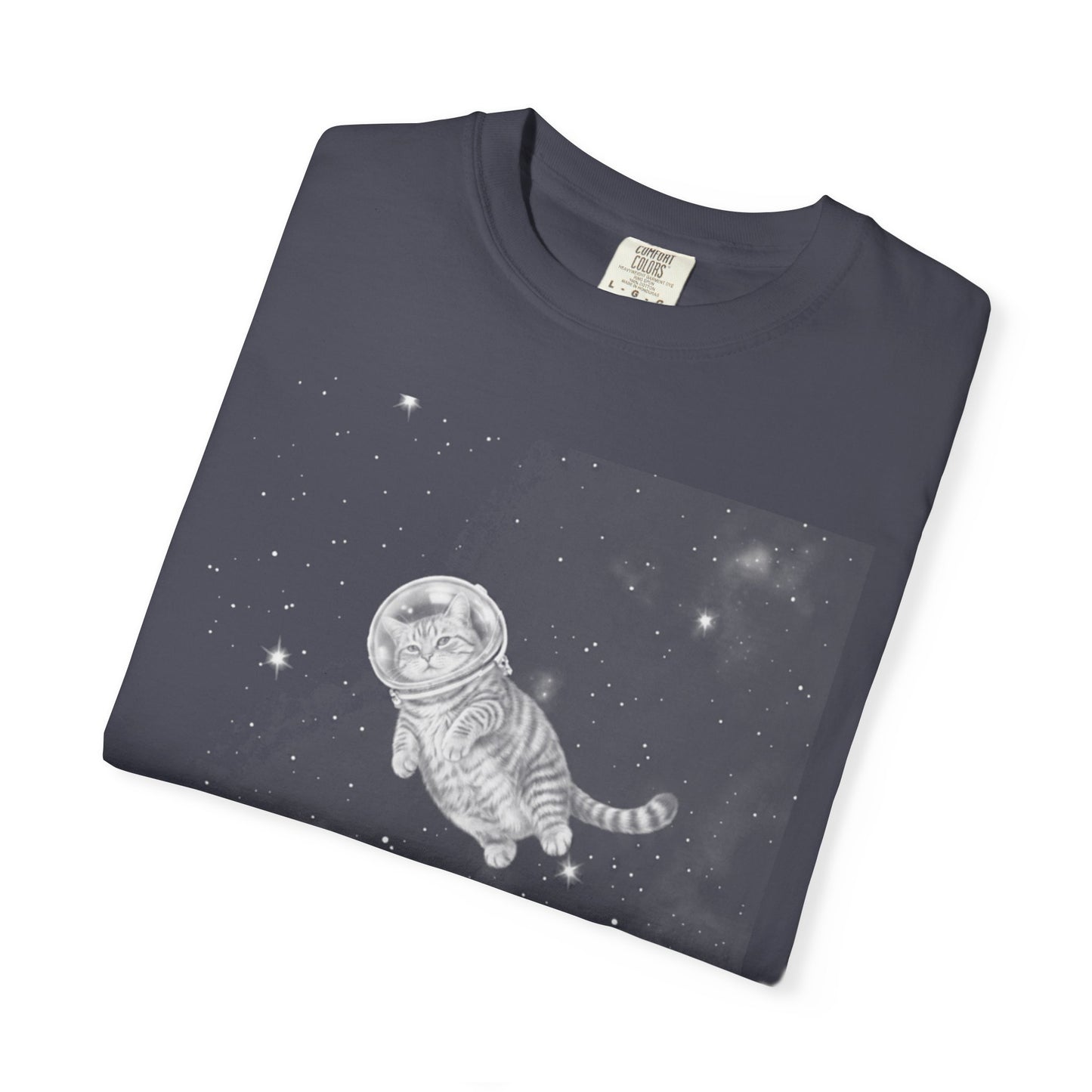 A Navy  crewneck t-shirt featuring a white line-art graphic of a cat floating in space with stars, laid flat on a light gray textured background.
