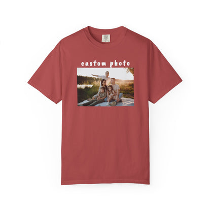 crimson t-shirt with a printed photo of a family by a lake on a white background