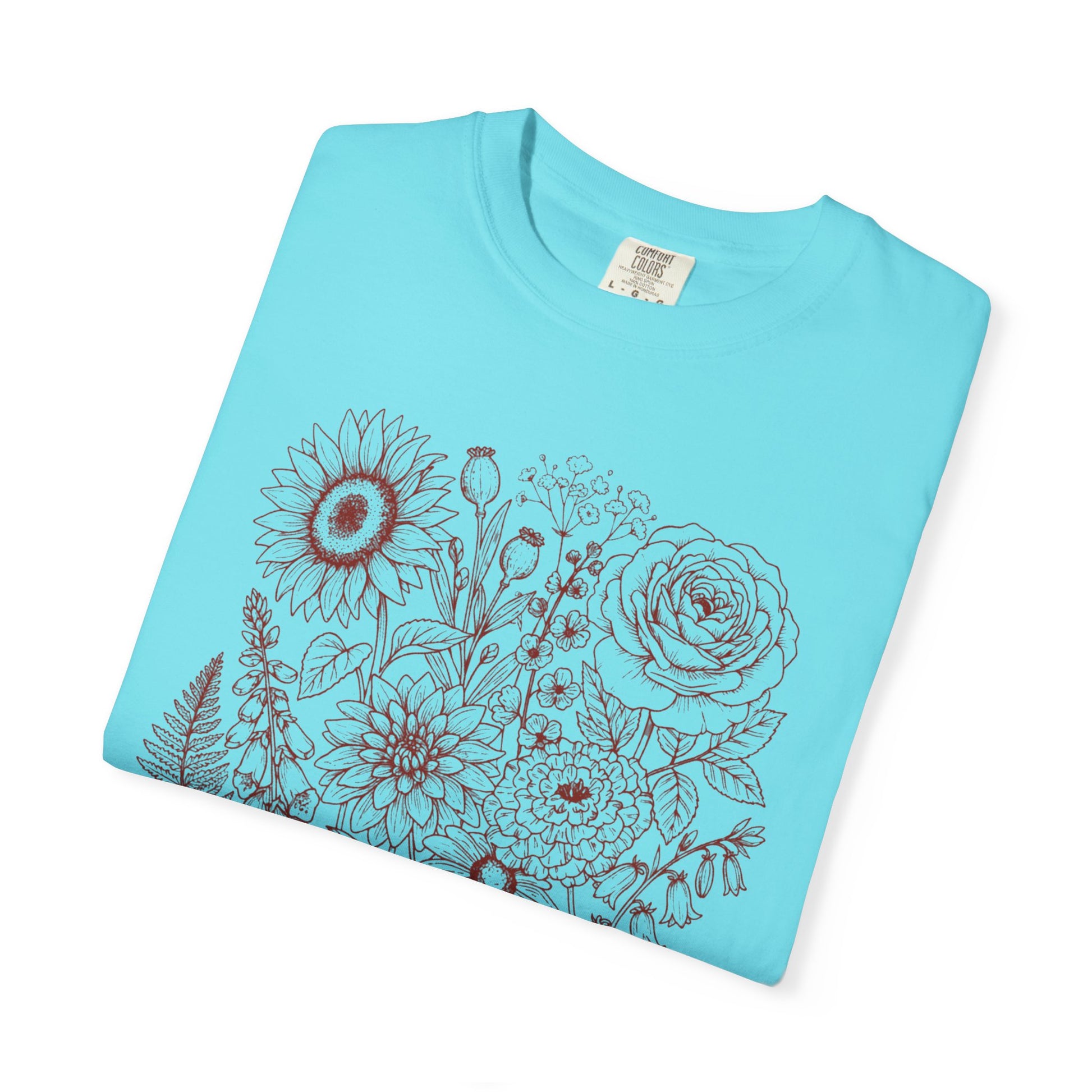 Comfort Colors® Lagoon Blue shirt with hand-drawn botanical line art print featuring sunflower, rose, dahlia, and wildflowers