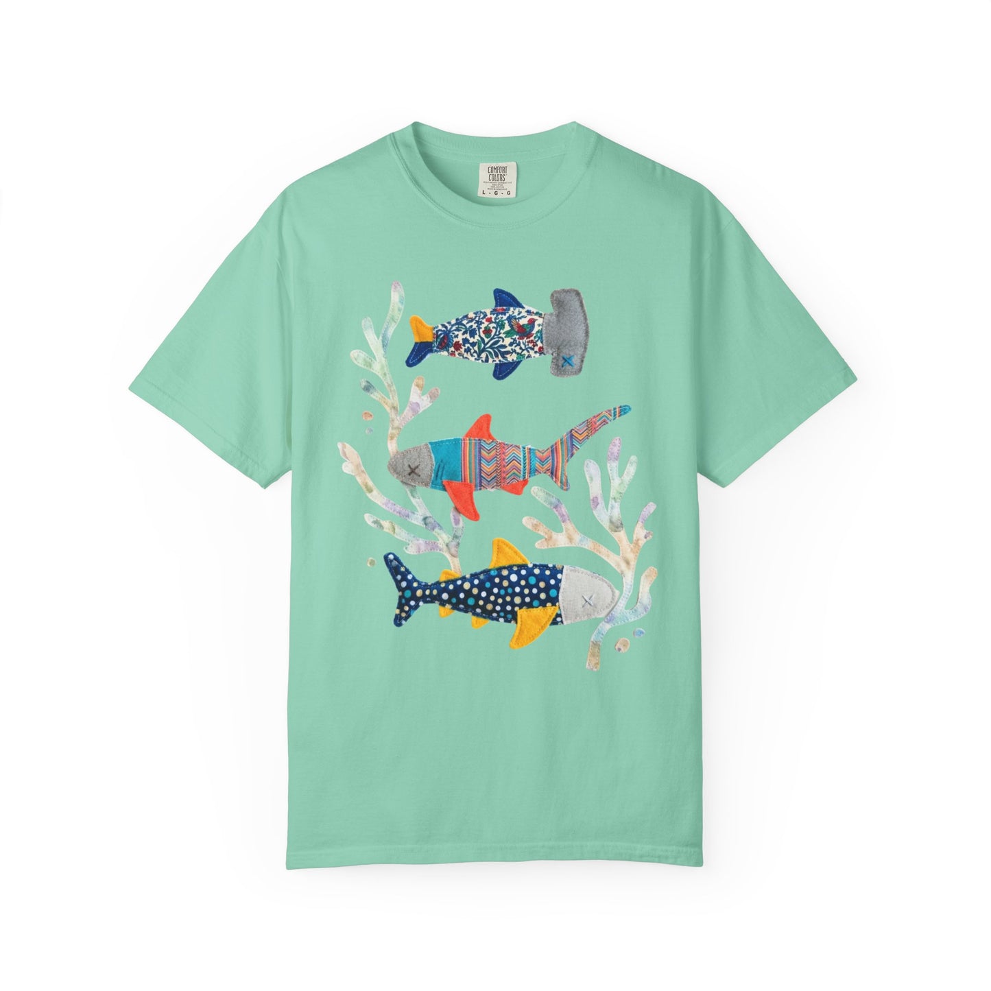 Faux patterned sharks graphic tee in island Reef showing the hand-painted shark illustration with tidepool textures — color mockup