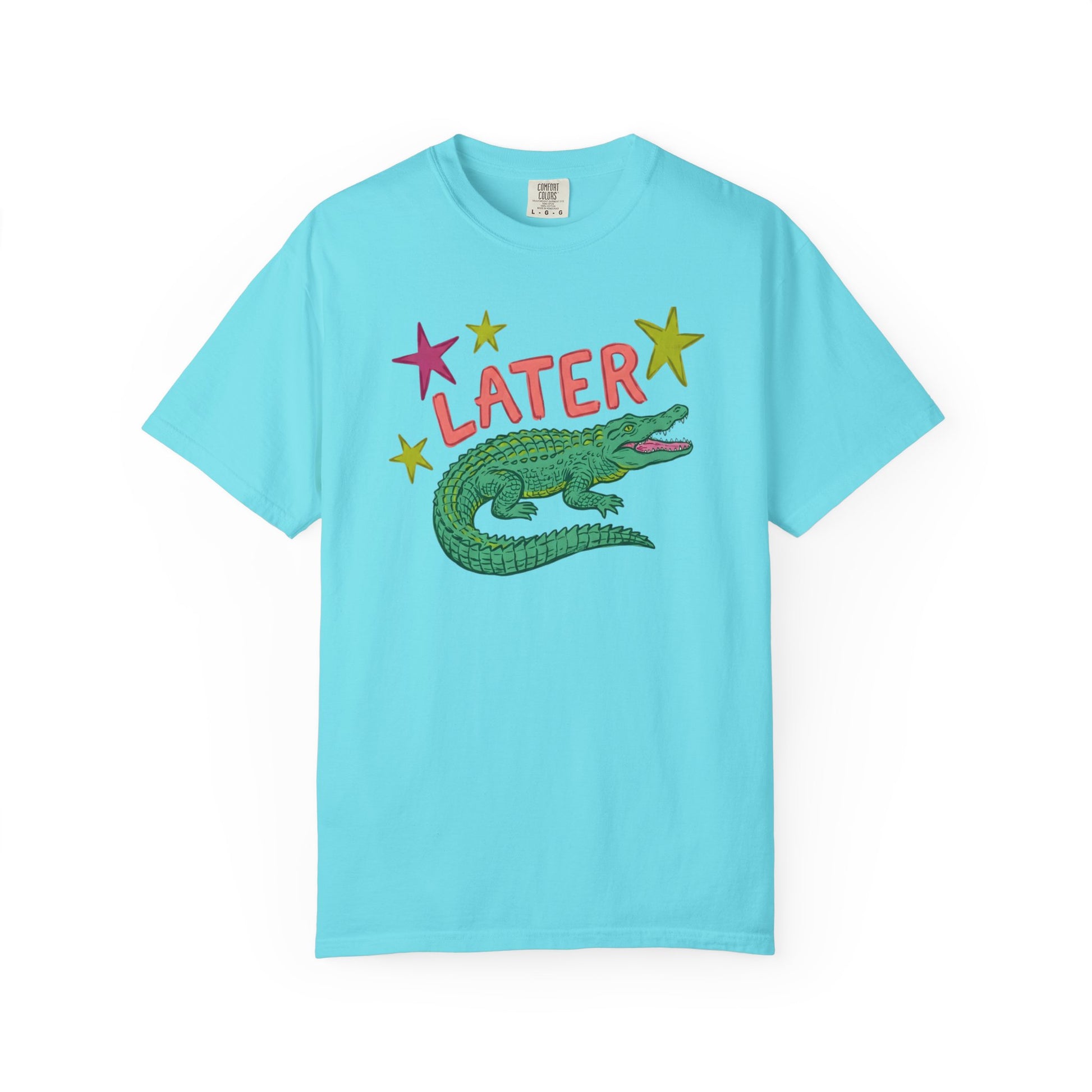chalky mint t-shirts with alligator graphics on front "later gator" and the text on back i"n a while crocodile"a plain background