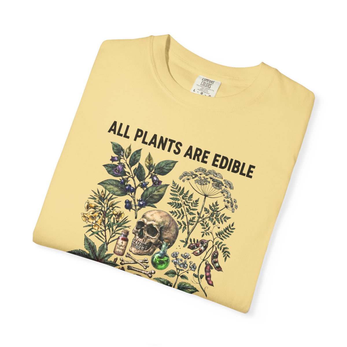 Botanical skull graphic tee in Butter— "All Plants Are Edible, Some Only Once" garment-dyed t-shirt