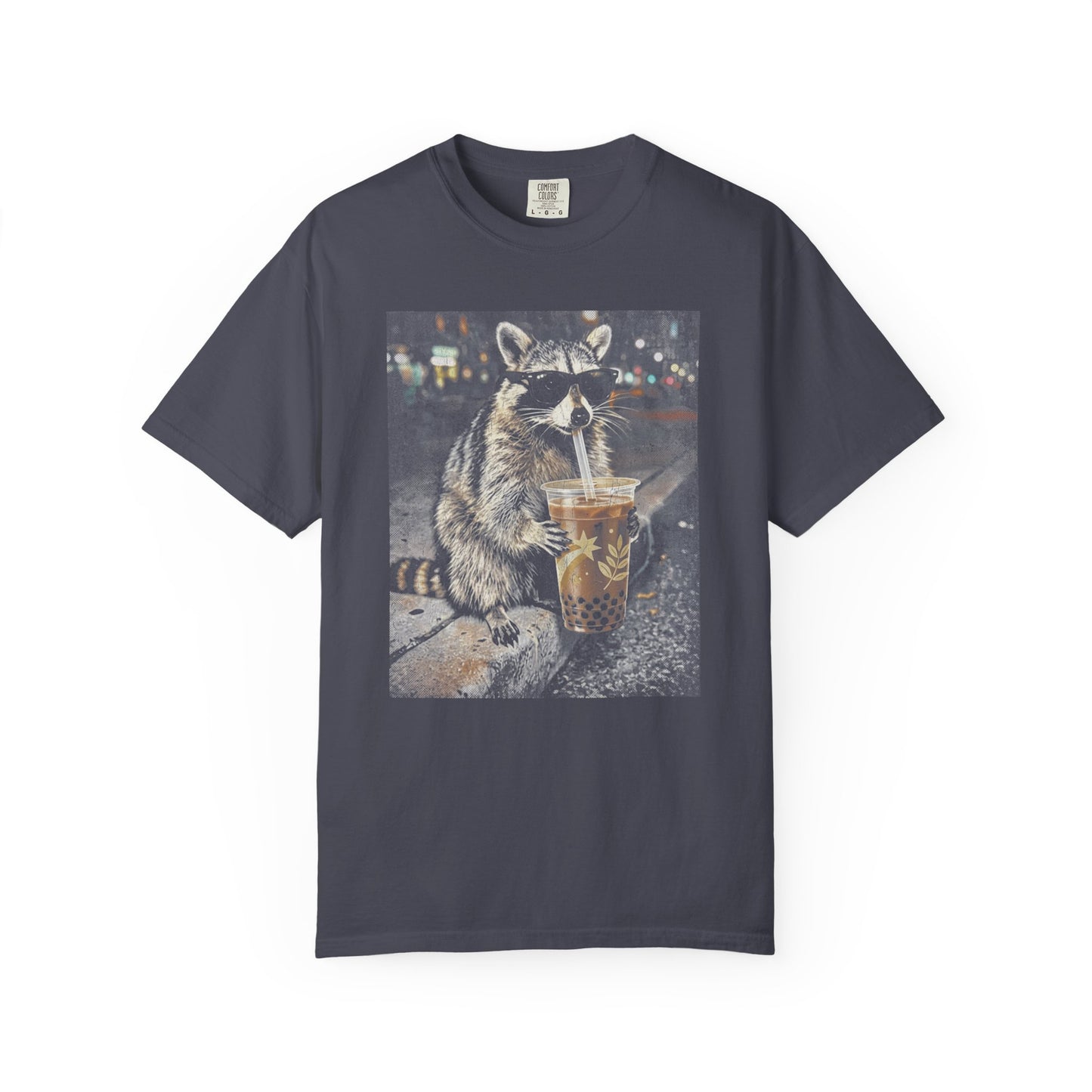 Navy blue t-shirt with a raccoon graphic drinking from a cup on a white background